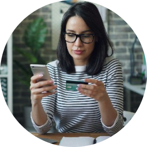 Woman holding phone and credit card
